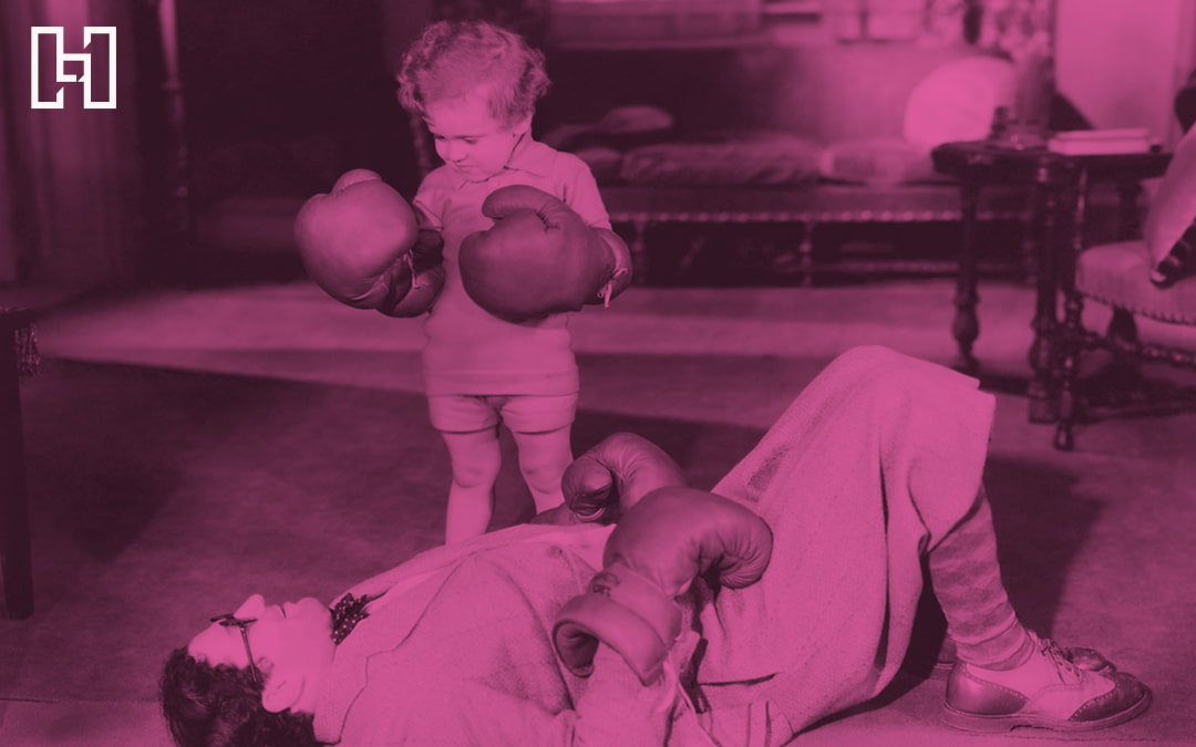 Featured image of vintage small girl wearing boxing gloves and man in suit knocked out