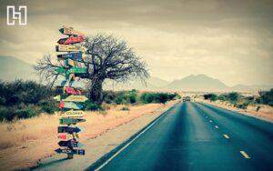 Feature image of highway with lots of direction signs