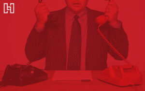 Featured image of business man with two phones