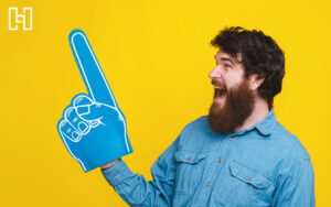 Featured image of man with number one foam finger sign