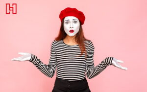 Woman Dressed as a Mime Shrugging