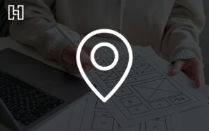 White location icon overlaying opaque webpage mockup on paper