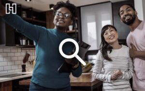 Real estate agent taking selfie with couple inside new home with magnifying glass icon in foreground
