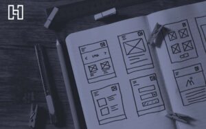 Drawings in a notebook of homepage wireframes for best homepage design examples