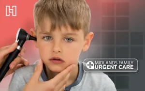 Child at urgent care getting ear checked by medical professional with Midlands Family Urgent Care and Hurrdat logos in foreground
