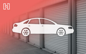 Car icon in front of self storage unit doors with Hurrdat logo in corner for content marketing and SEO case study for car size guide blog strategy
